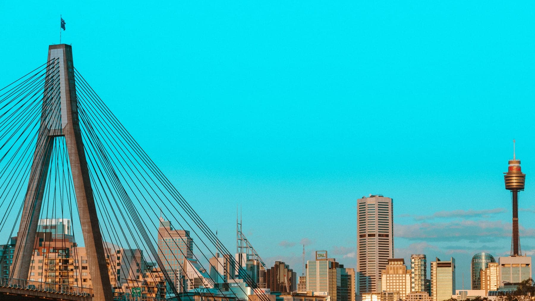 Sydney skyline and Anzac Bridge at dusk